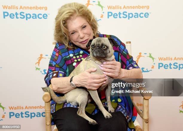 President and CEO of The Annenberg Foundation, Wallis Annenberg with Ozzy the dog at the grand opening of The Wallis Annenberg PetSpace on June 24,...