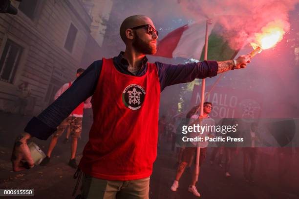 Thousands of members of Italian far-right movement CasaPound from all over Italy march with flags and shout slogans during a demonstration to protest...