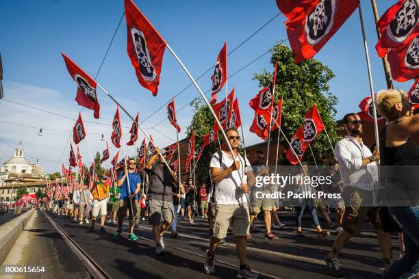 Thousands of members of Italian far-right movement CasaPound from all over Italy march with flags and shout slogans during a demonstration to protest...