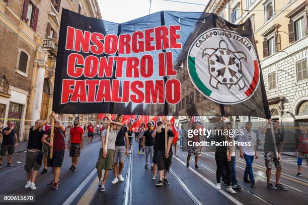 Thousands of members of Italian far-right movement CasaPound from all over Italy march with flags and shout slogans during a demonstration to protest...