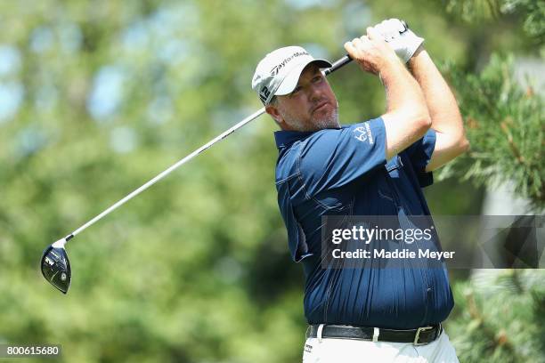 Boo Weekley of the United States plays his shot from the sixth tee during the third round of the Travelers Championship at TPC River Highlands on...