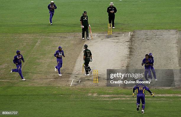 Nuwan Kulasekara of Sri Lanka is congratulated by team-mates after getting the wicket of Ricky Ponting of Australia during the Commonwealth Bank...