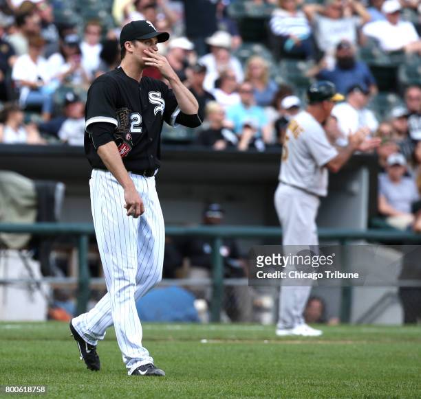 Chicago White Sox relief pitcher Jake Petricka reacts after giving up a two-run home run to the Oakland Athletics' Matt Olson in the seventh inning...
