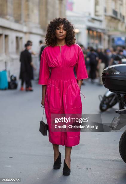 Gabrielle Union wearing a pink dress outside Hermes during Paris Fashion Week Menswear Spring/Summer 2018 Day Four on June 24, 2017 in Paris, France.