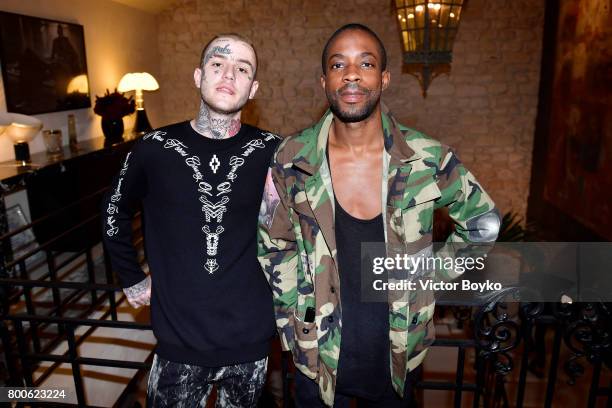 Lil Peep and guest attend the Balmain After Party during Paris Fashion Week on June 24, 2017 in Paris, France.