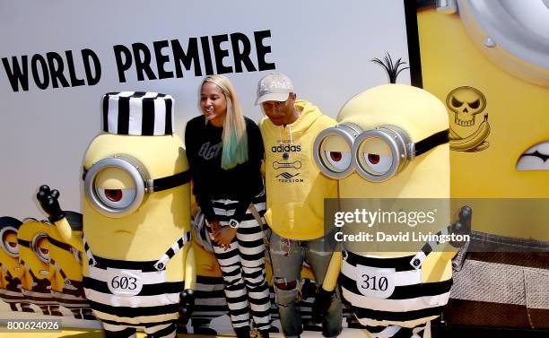 Model Helen Lasichanh and music producer Pharrell Williams attend the premiere of Universal Pictures and Illumination Entertainment's "Despicable Me...