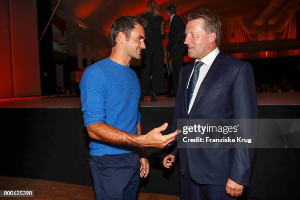 Tennis player Roger Federer and CEO Ralf Weber attend the Gerry Weber Open Fashion Night 2017 during the Gerry Weber Open 2017 at Gerry Weber Stadium...