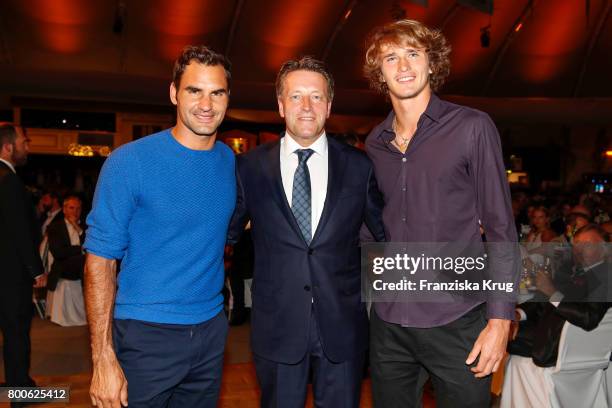 Tennis player Roger Federer, CEO Ralf Weber and tennis player Alexander Zverev attend the Gerry Weber Open Fashion Night 2017 during the Gerry Weber...