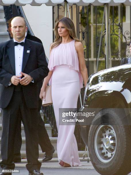 United States President Donald J. Trump and first lady Melania Trump depart the White House in Washington, DC on June 24, 2017. The Trumps left to...