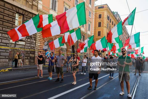 Thousands of members of Italian far-right movement CasaPound from all over Italy march with flags and shout slogans during a demonstration to protest...