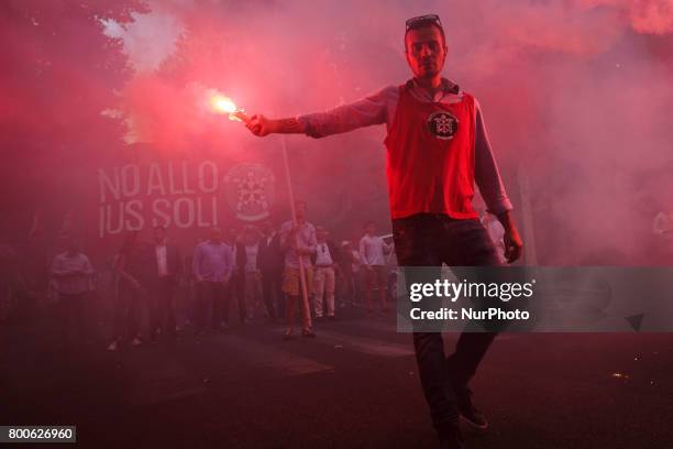 Thousands of members of Italian far-right movement CasaPound from all over Italy march with flags and shout slogans during a demonstration to protest...