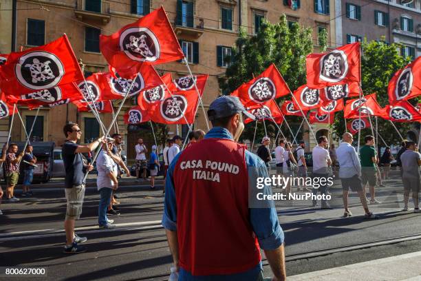 Thousands of members of Italian far-right movement CasaPound from all over Italy march with flags and shout slogans during a demonstration to protest...