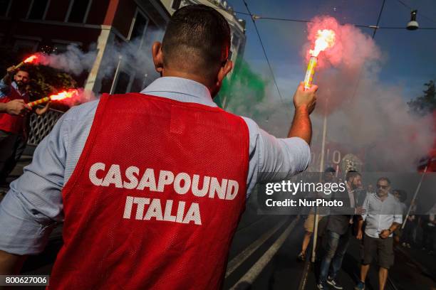 Thousands of members of Italian far-right movement CasaPound from all over Italy march with flags and shout slogans during a demonstration to protest...