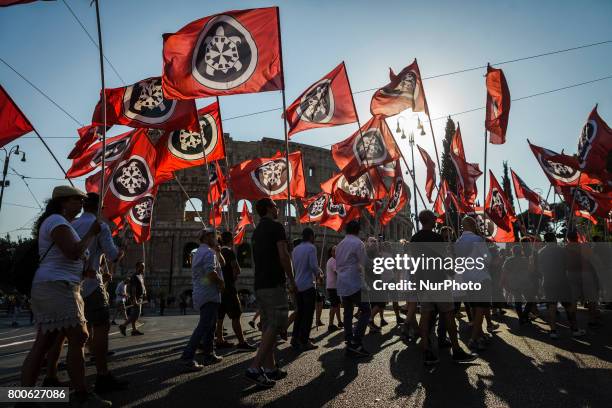 Thousands of members of Italian far-right movement CasaPound from all over Italy march with flags and shout slogans during a demonstration to protest...