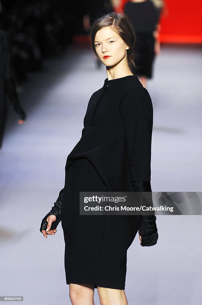A model walks the runway wearing the Giambattista Valli Fall/Winter ...