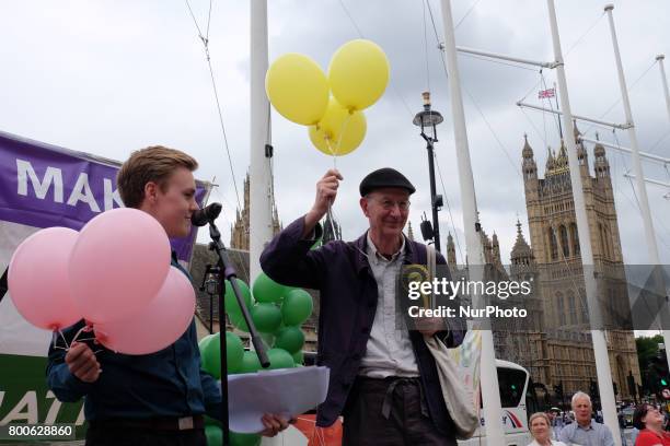 Balloons representing under-represented political parties are shown to demonstrate the vote share to seats in Parliament. The Make votes matter...