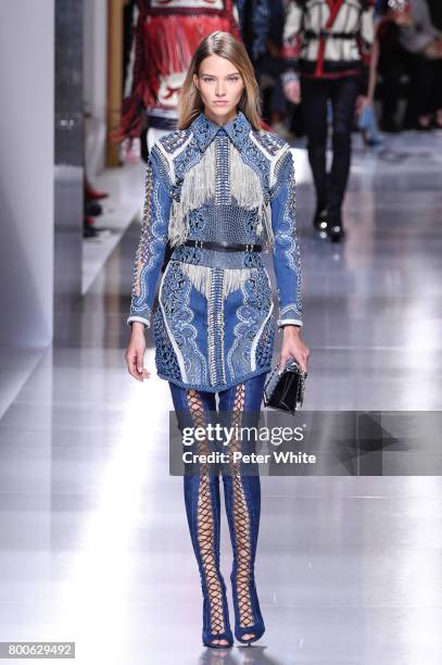 Sasha Luss walks the runway during the Balmain Menswear Spring/Summer 2018 show as part of Paris Fashion Week on June 24, 2017 in Paris, France.