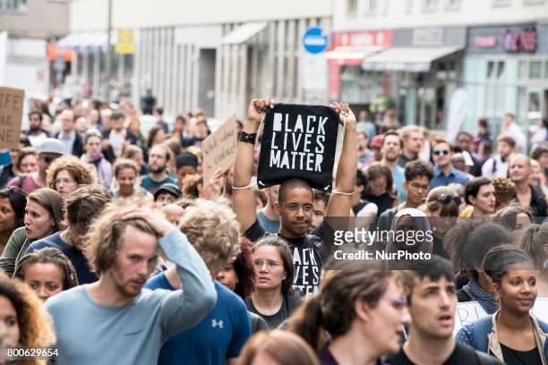 Demonstrate against racism towards black people in Berlin, Germany on June 24, 2017.