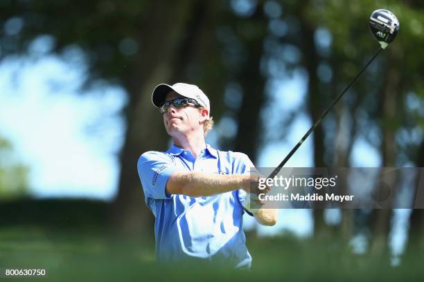 David Hearn of Canada plays his shot from the 18th tee during the third round of the Travelers Championship at TPC River Highlands on June 24, 2017...