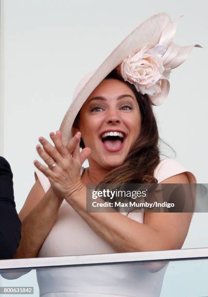 Kelly Brook watches the racing as she attends day 5 of Royal Ascot at Ascot Racecourse on June 24, 2017 in Ascot, England.
