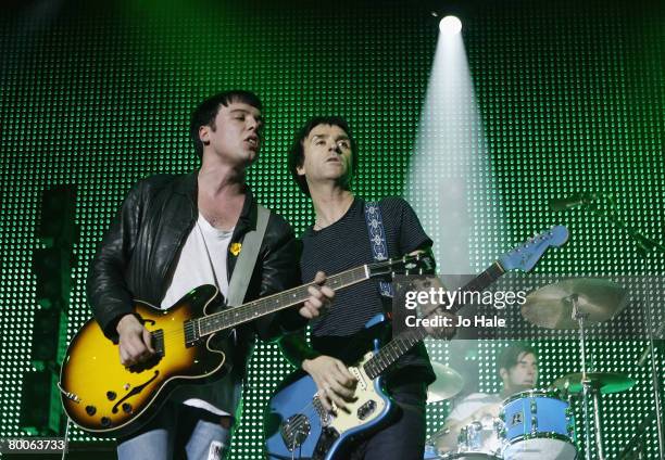 Johnny Marr performs with Ryan Jarman and The Cribs on stage at the Shockwaves NME Awards Big Gig 2008 at the O2 Arena on February 28, 2008 in...