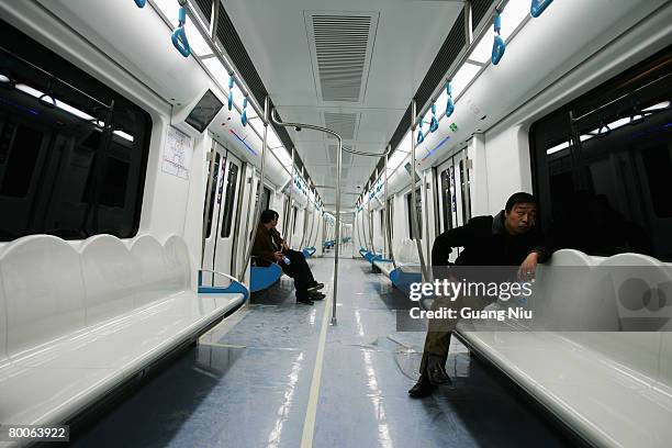 Passengers test a train of the Beijing No. 10 Subway Line on February 29, 2008 in Beijing, China. The first phase project of Subway Line 10 began...