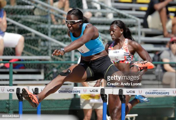 Sharon Day-Monroe clears a hurdle in the Heptathlon 100 Meter Hurdles during Day 3 of the 2017 USA Track & Field Championships at Hornet Satdium on...