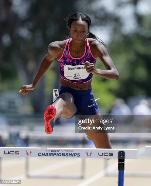 Dalilah Muhammad clears a hurdle in the Women's 400 Meter Hurdles semi-final during Day 3 of the 2017 USA Track & Field Championships at Hornet...