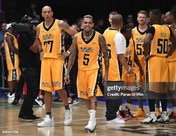 Doug Christie and Chris Brown at the Celebrity Basketball Game, presented by Sprite and State Farm, during the 2017 BET Experience, at Los Angeles...