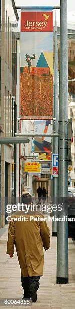 Banners hang from a lamposts on February 28, 2008 in St Helier, Channel Islands. Police on the island of Jersey are continuing to searches of...