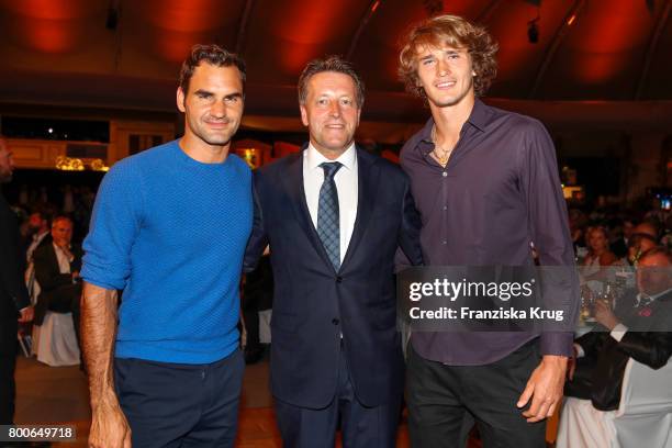 Tennis player Roger Federer, CEO Ralf Weber and tennis player Alexander Zverev attend the Gerry Weber Open Fashion Night 2017 during the Gerry Weber...