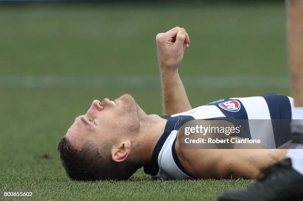 Joel Selwood of the Cats is knocked out after a collision during the round 14 AFL match between the Geelong Cats and the Fremantle Dockers at Simonds...