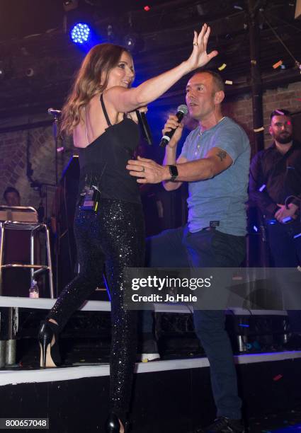 Geri Horner nee Halliwell with Jeremy Joseph waves goodbye to fans after she performs on stage at G-A-Y Club at Heaven on June 24, 2017 in London,...