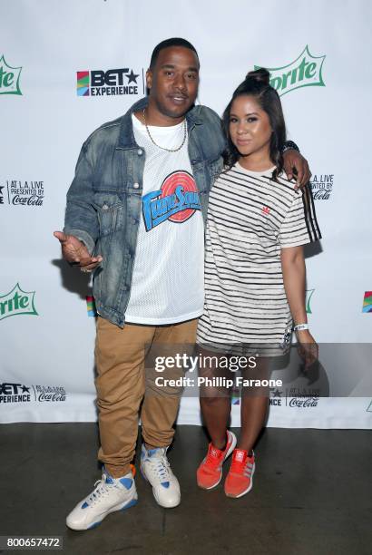 Kawan Prather and Angela Yee pose backstage at the Celebrity Basketball Game, presented by Sprite and State Farm, during the 2017 BET Experience, at...