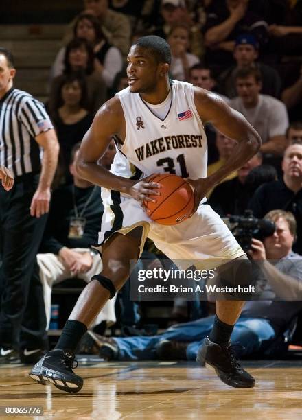 Jamie Skeen of the Wake Forest Demon Deacons looks for an open teammate to pass the ball to versus the Duke Blue Devils at the LJVM Coliseum on...