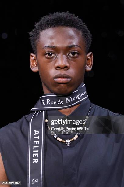 Model, beauty detail, walks the runway during the Dior Homme Menswear Spring/Summer 2018 show as part of Paris Fashion Week on June 24, 2017 in...