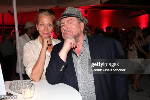 Armin Rohde and his girlfriend and manager Karen Boehne during the 'Audi Director's cut' Party during the Munich film festival at Praterinsel on June...