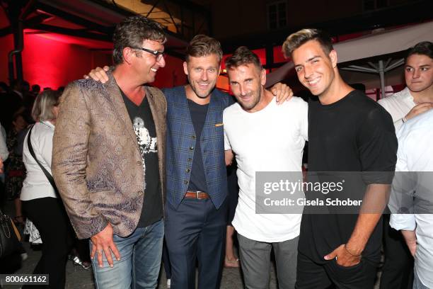 Hans Sigl, Jens Atzorn Mark Keller and his son Aaron Keller during the 'Audi Director's cut' Party during the Munich film festival at Praterinsel on...