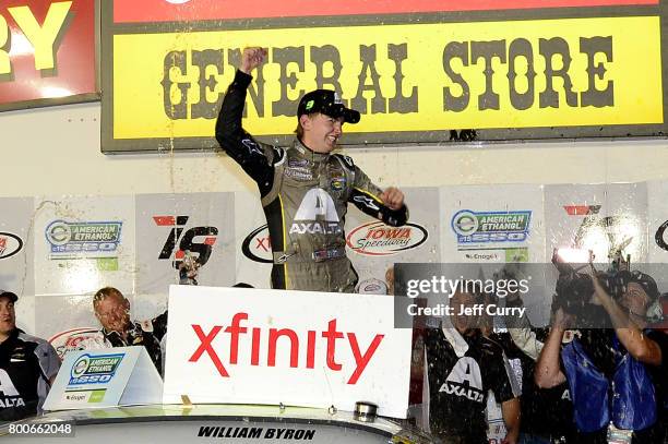 William Byron, driver of the AXALTA/WINDSORWindow&Door Chevrolet, celebrates in Victory Lane after winning the NASCAR XFINITY Series American Ethanol...