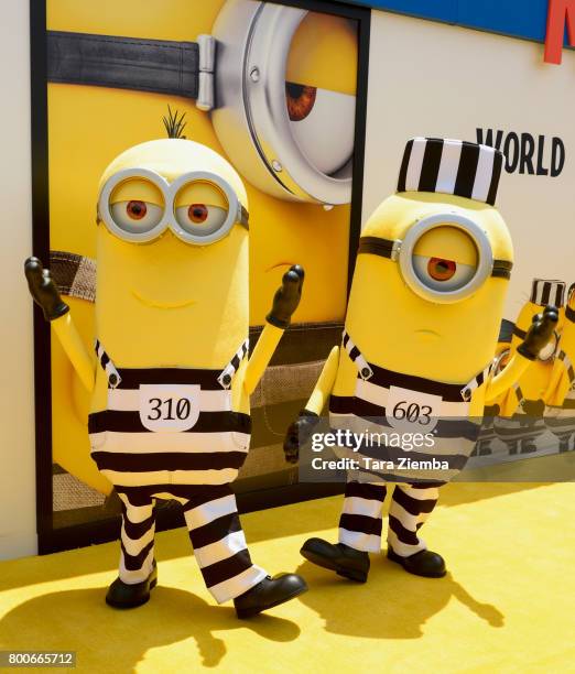 Minions pose for a photo on the yellow carpet at the Premiere Of Universal Pictures And Illumination Entertainment's 'Despicable Me 3' at The Shrine...