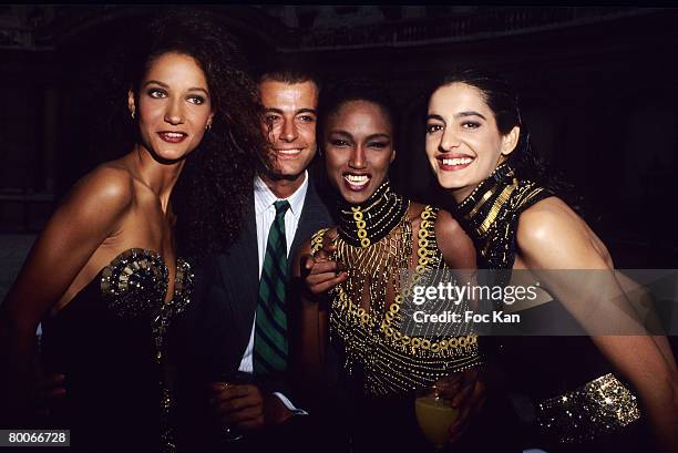 Marpessa Hennink, Alexandre Zouari, Katoucha Niane and Celia attend a Spring /Summer 1990/1991 Gianni Versace High Fashion Show Exhibition Party at...