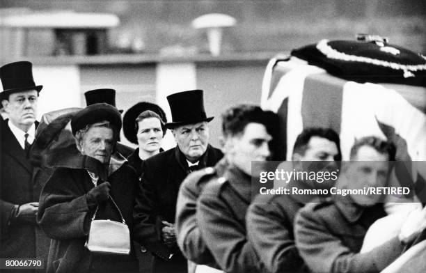 Lady Clementine Churchill is escorted on the arm of her son Randolph as they follow the coffin of her husband, British statesman Winston Churchill at...