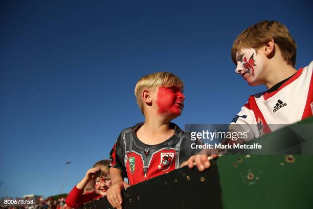 Young Dragons fan watch the round 16 NRL match between the St George Illawarra Dragons and the Newcastle Knights at UOW Jubilee Oval on June 25, 2017...