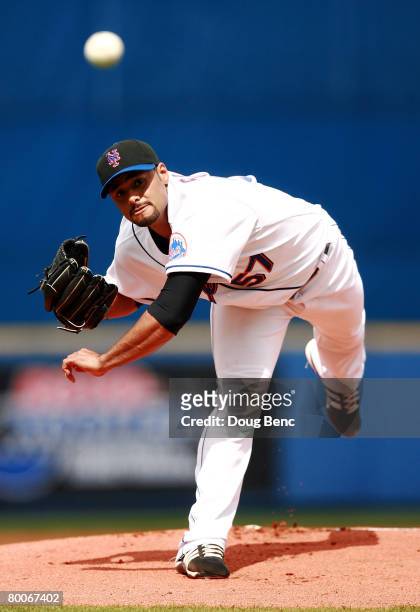 Starting pitcher Johan Santana of the New York Mets pitches against the St. Louis Cardinals in a Spring Training game at Tradition Field on February...