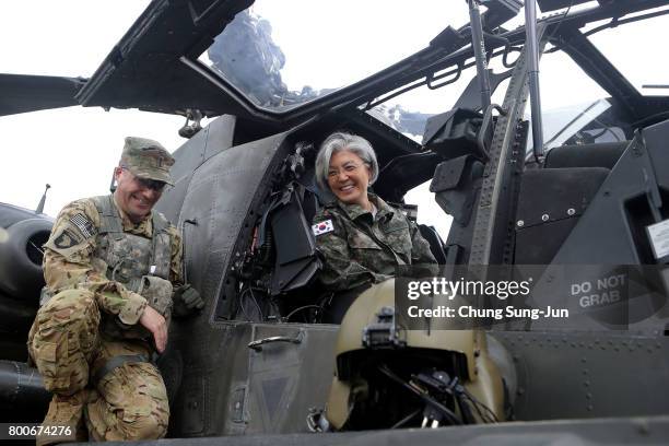 South Korean Foreign Minister Kang Kyung-wha sits in a AH-64D Apache longbow helicopter as she visits the headquarters of the South Korea-US Combined...
