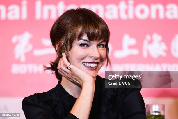 Ukrainian-born actress Milla Jovovich attends the Press Conference for Actors on the Red Carpet for Golden Goblet Awards during the 20th Shanghai...