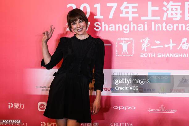 Ukrainian-born actress Milla Jovovich attends the Press Conference for Actors on the Red Carpet for Golden Goblet Awards during the 20th Shanghai...