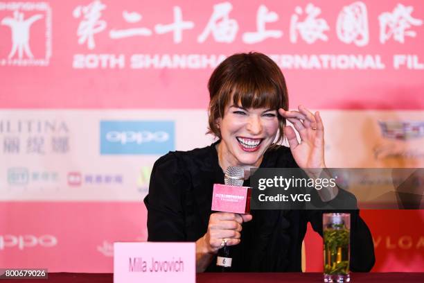 Ukrainian-born actress Milla Jovovich attends the Press Conference for Actors on the Red Carpet for Golden Goblet Awards during the 20th Shanghai...