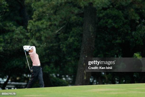 Natsu Nagai of Japan hits a second shot on the 18th hole during the final round of the Yupiteru The Shizuoka Shimbun & SBS Ladies at the Shizuoka...