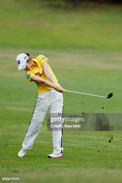 Ai Yamazato of Japan hits a second shot on the 18th hole during the final round of the Yupiteru The Shizuoka Shimbun & SBS Ladies at the Shizuoka...